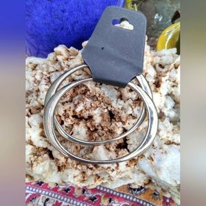 New silver toned bangle bracelets